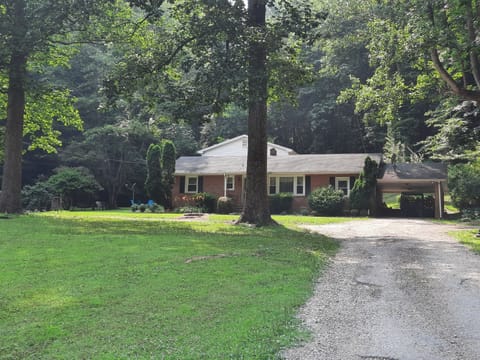 Family home nestled on wooded lot with lots of private space to enjoy. 