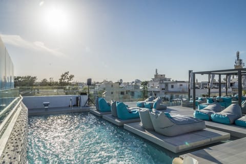 Seasonal outdoor pool, open 9:00 AM to 7:30 PM, sun loungers