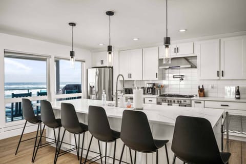 "Everyone had their own walk in shower and bedroom to relax in. Gorgeous sunsets, beautiful kitchen and huge island everything was perfect!" - Susan