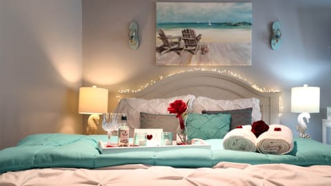 Your inviting, romantic queen bedroom. where stress slips off & relaxation slips on
