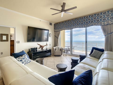 Living room with sectional and TV