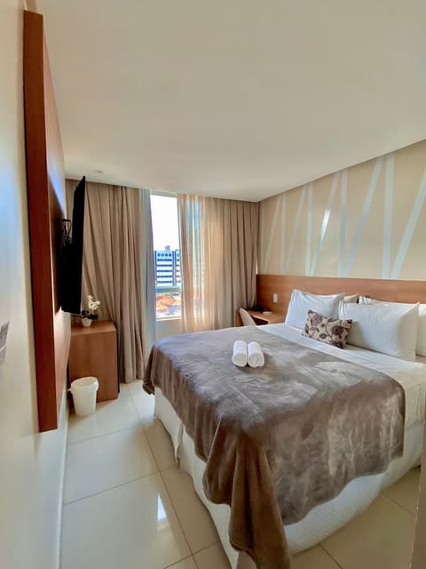 Premium Room | Minibar, desk, blackout drapes, iron/ironing board
