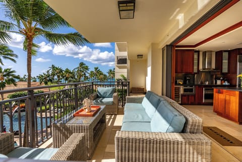 Relax on your private lanai with resort, palm, and ocean views just steps away.