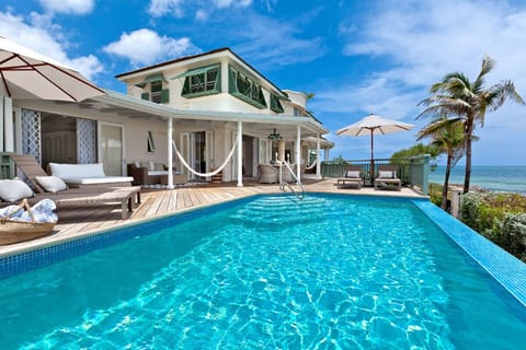 Emily House - Overlooking the pool with large sun loungers