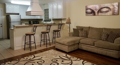 Open floor plan Living Room w/ Spacious Kitchen