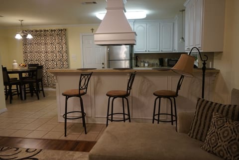 Kitchen & Dining view w/ 3 bar stools for addition seating
