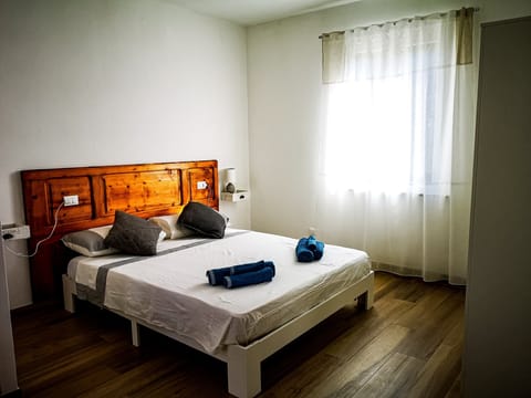 Apartment, 1 Bedroom | Premium bedding, blackout drapes, cribs (free), WiFi (free)