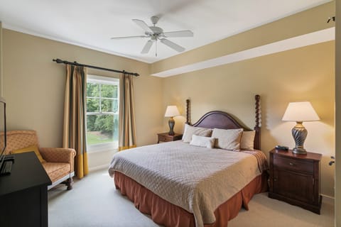 Comfortable king size bed with garden view