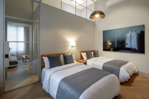 Premium bedding, pillowtop beds, minibar, in-room safe