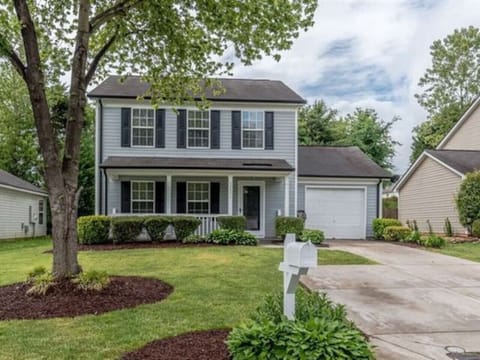 A quiet cul-de-sac, a welcoming front, and parking for three. Welcome home.