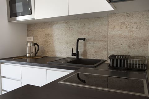 Kitchen with all necessary elements to make your vacation better