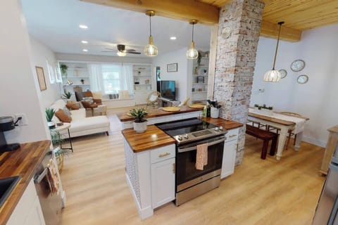 Living Room/ Kitchen - Please note that the couch has been substituted for a leather couch. New photos to come