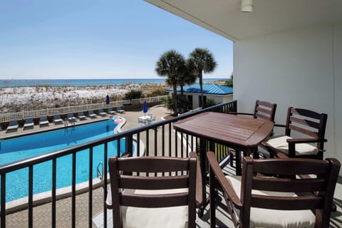 Private balcony with beach and pool views