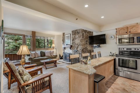 Living room & kitchen with bar seating