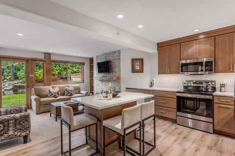 Fully remodeled kitchen with island dining