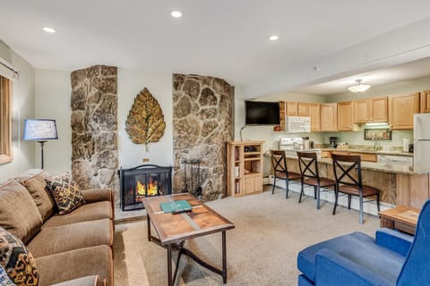 Living room with wood-burning fireplace