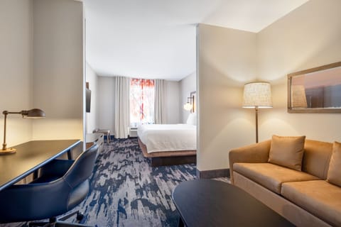 Suite, 1 King Bed with Sofa bed | Blackout drapes, iron/ironing board, free cribs/infant beds, free WiFi