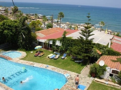 Seasonal outdoor pool, pool umbrellas, sun loungers