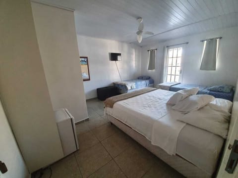 Standard Quadruple Room | 1 bedroom, premium bedding, minibar, individually decorated