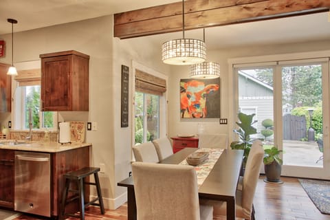 Large dining table off of the kitchen. Perfect for large meals and game nights.