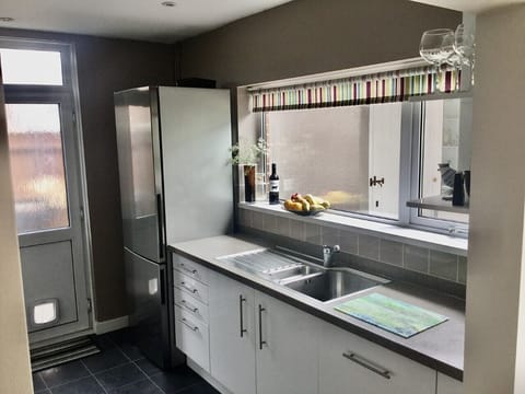 Kitchen  - large fridge freezer. Additional fridge in utility room