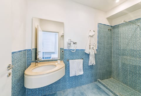 Free toiletries, hair dryer, bidet, towels