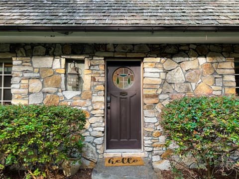 The Stone Pool House stained-glass window reflects the unique character of this home.