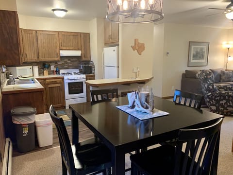 Upstairs is the kitchen complete with gas range and fully stocked.