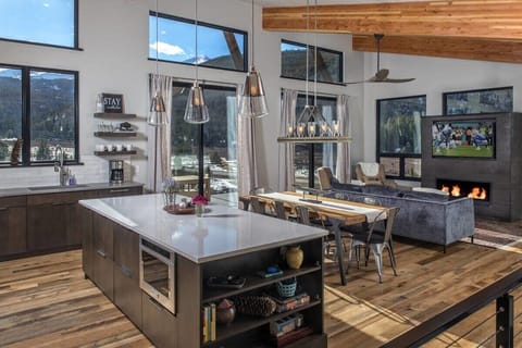 Living room, dining room and kitchen share an open concept