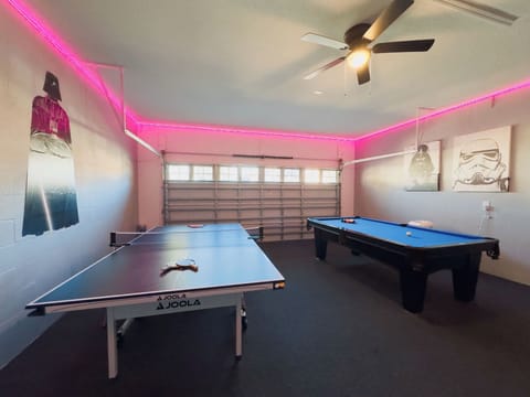 Games room showing pool table and ping pong table