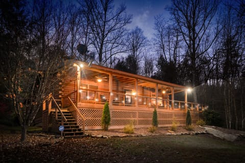 Front of cabin at night
