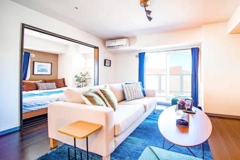 Apartment, Non Smoking | Living area | Flat-screen TV