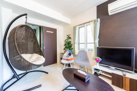 Apartment, Non Smoking | Living area | Flat-screen TV