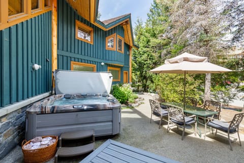 Exterior - Private hot tub and patio furniture for outdoor summer dining.
