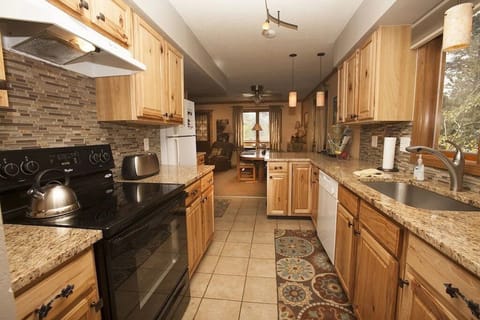 Beautiful stocked kitchen with EVERYTHING you could need (and a heated floor too