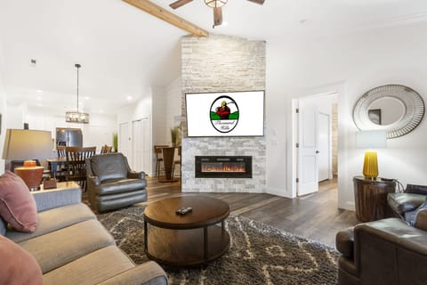 Open Floor Concept with Cable, Flat Screen and Seasonal Fireplace