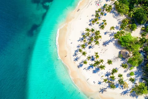 On the beach, sun loungers, beach towels