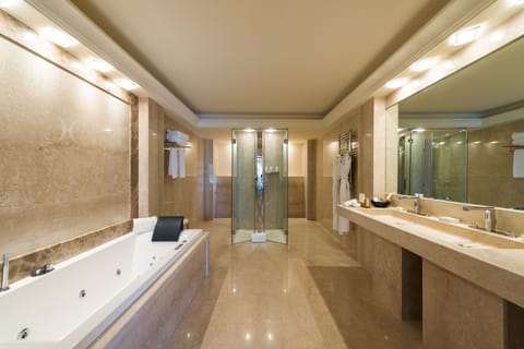 Presidential Suite | Bathroom | Shower, designer toiletries, hair dryer, bathrobes