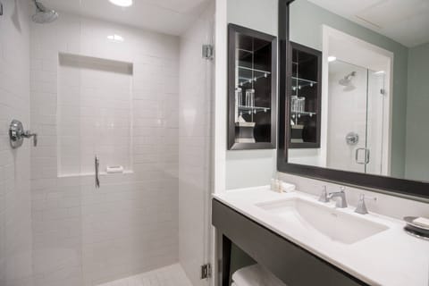Room, 1 Queen Bed | Bathroom | Combined shower/tub, rainfall showerhead, free toiletries, hair dryer
