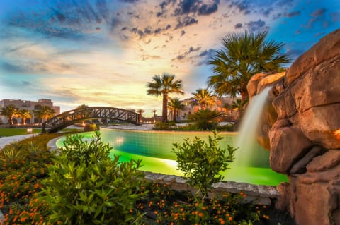 8 outdoor pools, pool umbrellas, sun loungers