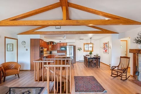 Main floor open concept with stairs to lower level.