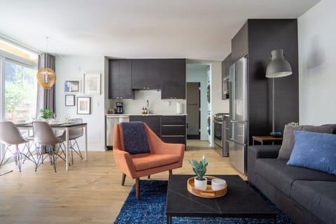 Relaxing open living space with comfortable furnishings and modern kitchen