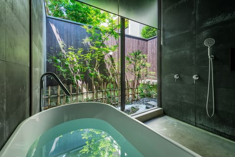 Traditional House, 3 Bedrooms, Kitchen, Garden View (Non Smoking) | Bathroom | Combined shower/tub, deep soaking tub, hair dryer, slippers