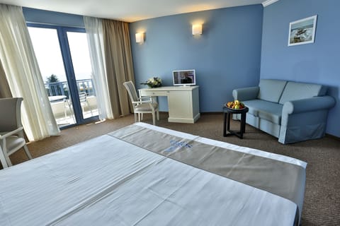 Minibar, desk, blackout drapes, iron/ironing board