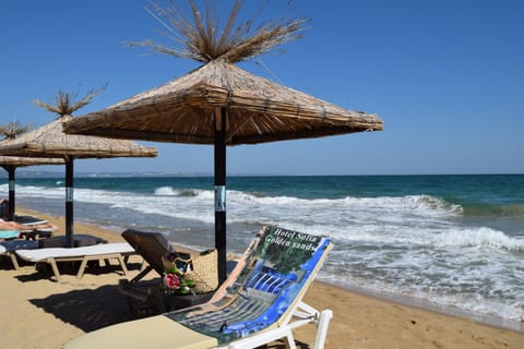 Private beach nearby, white sand, sun loungers, beach umbrellas