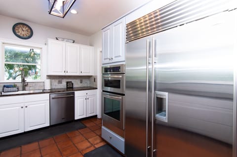 Subzero fridge with built-in water and ice maker.