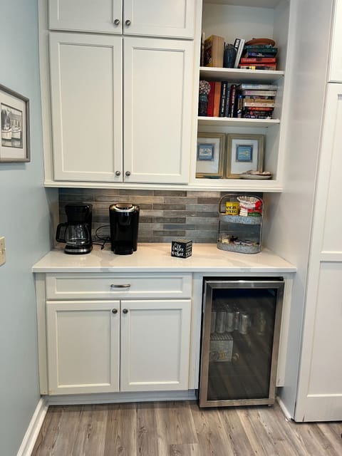 Coffee bar and drink fridge.