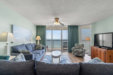 The ocean front living room is well-appointed with comfortable furnishings.