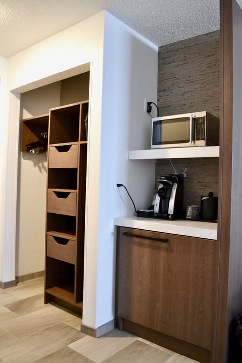 Desk, laptop workspace, blackout drapes, iron/ironing board