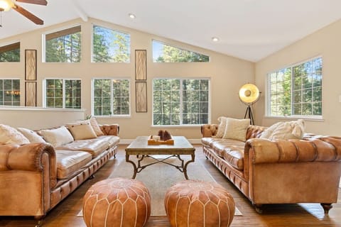 Your over-spaced living room will boast a pair of classic worn-in leather couches, modern Moroccan ottomans, and fluffy couch pillows- a sweet space to catch up with your friends and family.  